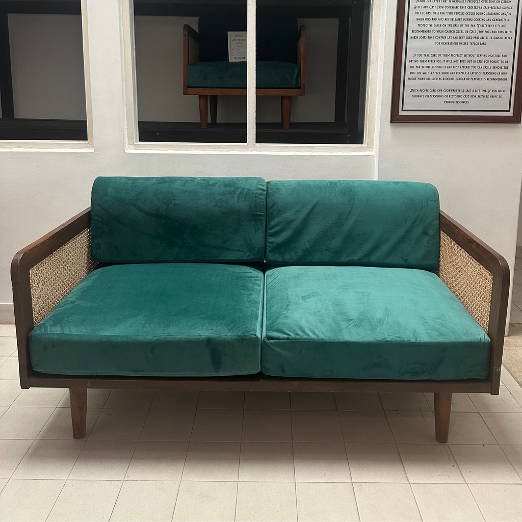 Epsom Wooden Three Seater Green Velvet Sofa with Handwoven Rattan Arms