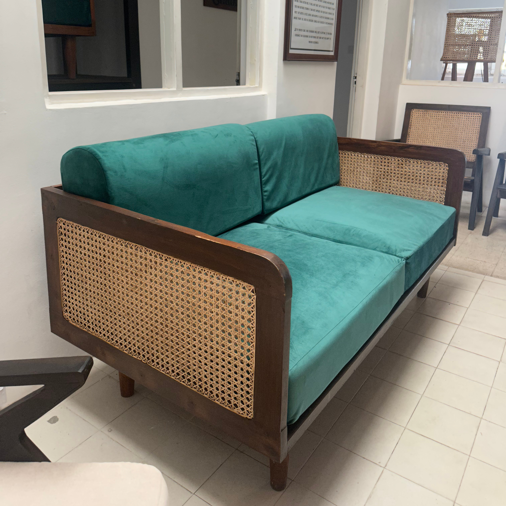 Epsom Wooden Three Seater Green Velvet Sofa with Handwoven Rattan Arms