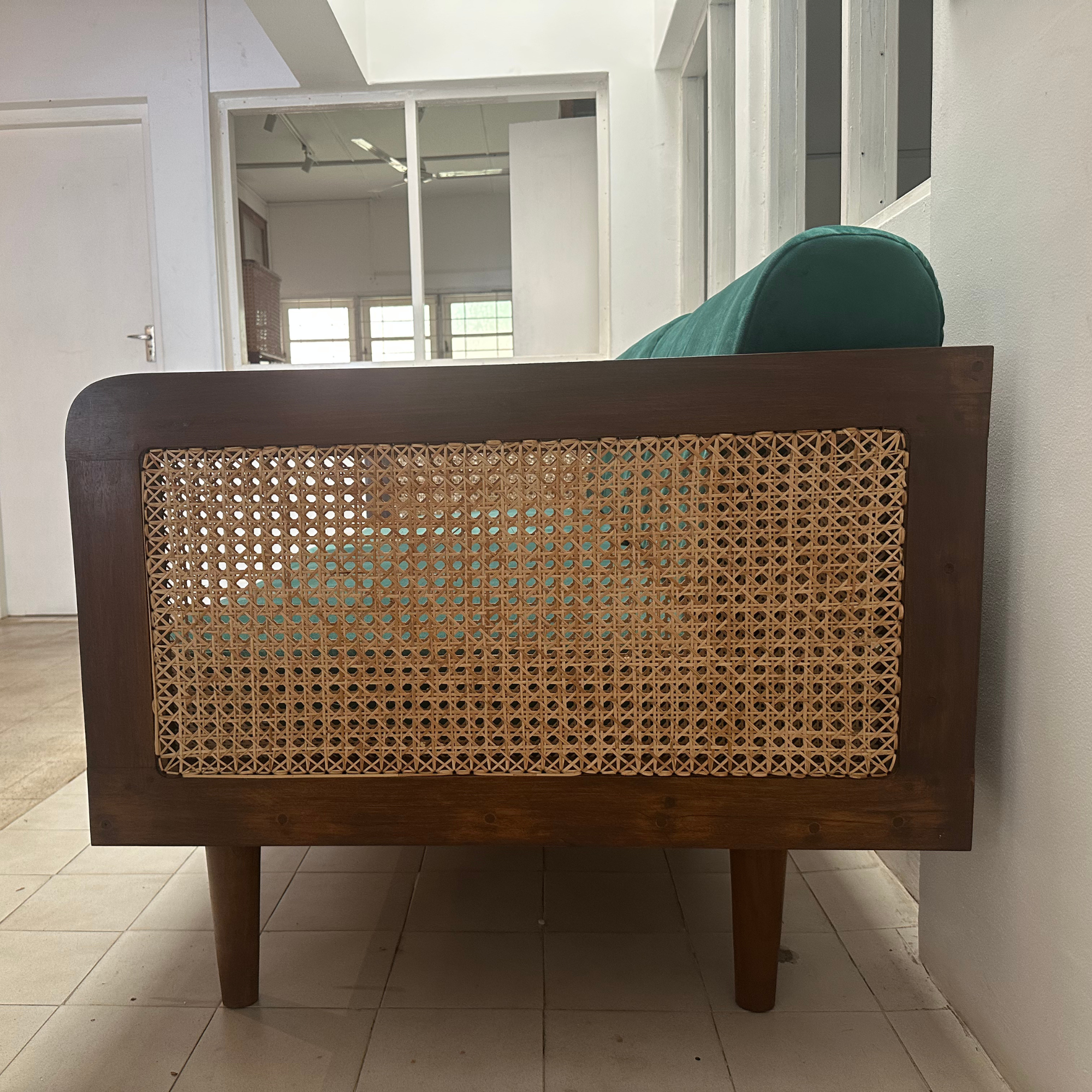 Epsom Wooden Three Seater Green Velvet Sofa with Handwoven Rattan Arms